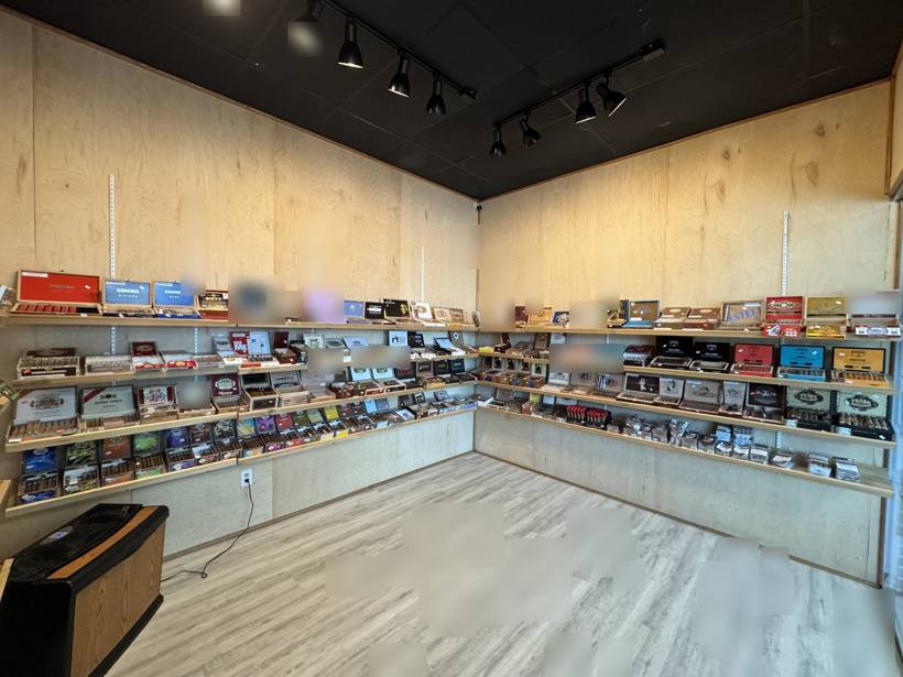 Cigar and humidor display wall inside the shop