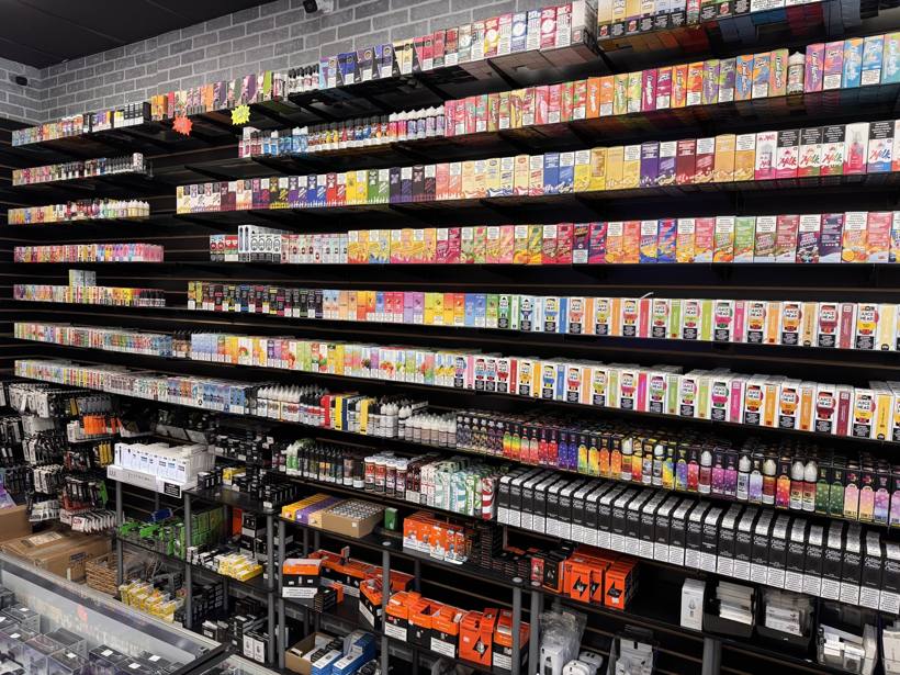Disposable vape and e-liquid selection wall